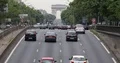 Cars Traffic Jam on Crowded Champs Elysees Boulevard Arch of Triumph in Paris 4k or 4k+ Resolution