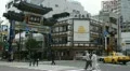 Cars Traffic People Crossing Crosswalk Busy City Street Yokohama China Town Gate HD Footage