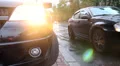 Cars traffic rain, city vehicles drive by, wet tarmac weather HD Footage