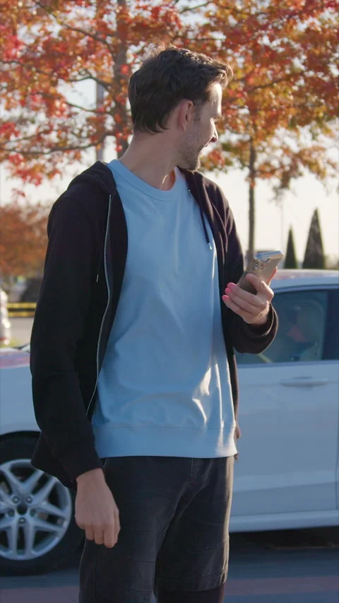 Carsharing driver demonstrates speed of vehicle delivery Stock Footage 300544909