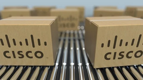 Carton boxes with Cisco logo move on roller conveyor. Conceptual editorial Video stock 109339650