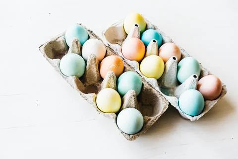 Carton of painted eggs ready for Easter Stock Photos