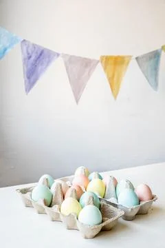 Carton of painted eggs ready for Easter Stock Photos