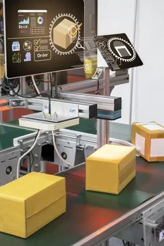 Carton sorting using a mechanical system for delivering goods within the fa.. Stock Photos