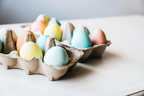 Cartons of dyed eggs ready for Easter Stock Photos