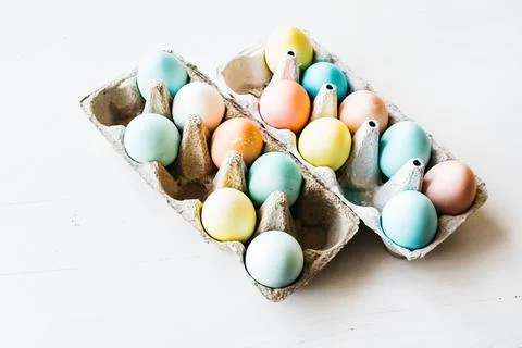 Cartons of dyed eggs ready for Easter Stock Photos