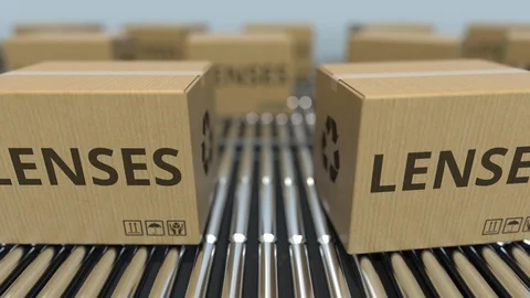 Cartons with lenses on roller conveyors. Loopable 3D animation Video stock 112838050