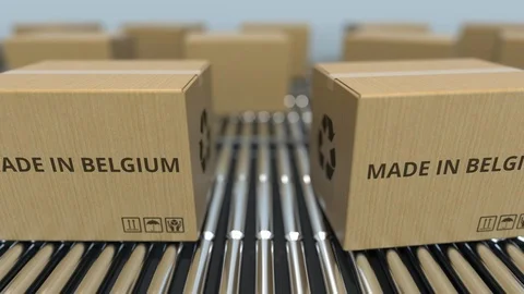 Cartons with MADE IN BELGIUM text on roller conveyor. Belgian goods related Video stock 108870959