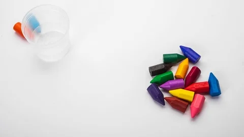 Cartoon about a set of colored wax fines on an white background Stock Footage 124160089