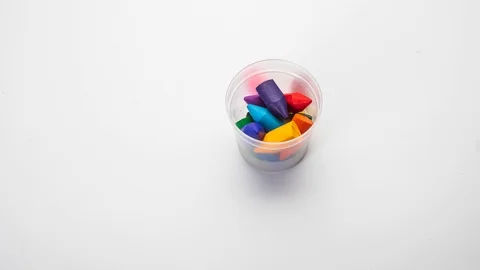 Cartoon about a set of colored wax fines on an white background Stock Footage 124600862