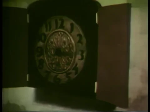 Cartoon of  clock going into hiding Stock Footage 261022388