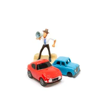 Cartoon doll standing shouting using a megaphone. Stock Photos