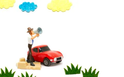 Cartoon doll standing shouting using a megaphone. Stock Photos