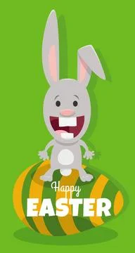 Cartoon Easter bunny on painted egg greeting card Cartoon illustration of ... 스톡 사진