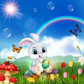 Cartoon rabbit decorating an Easter egg Stock Illustration