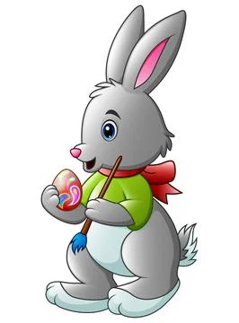 Cartoon rabbit painting easter egg with a brush Stock Illustration