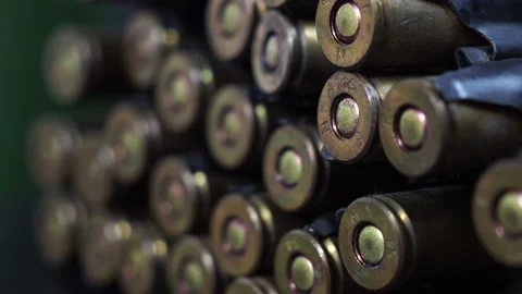 Cartridges from a machine gun on a black background. Stock Footage 170903122