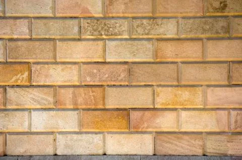 Carved bricks in a wall Stock Photos