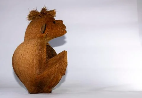 Carved coconut monkey Stock Photos