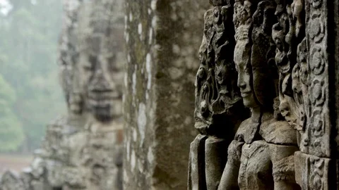 Carved faces in rain at Ankor Wat 動画素材 81006652