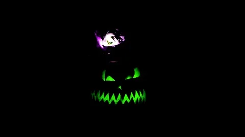 Carved Halloween pumpkin lights inside Stock Footage 116716420