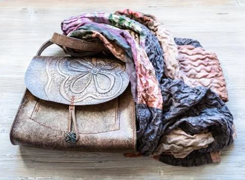 Carved handbag wrapped of the patchwork scarf Stock Photos