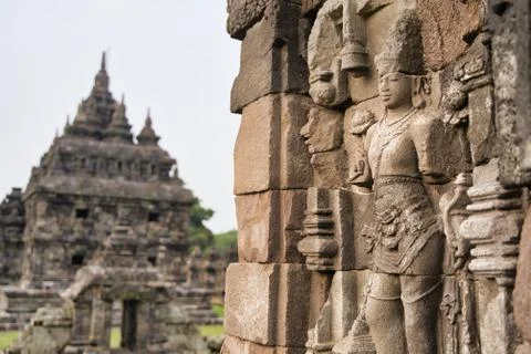 Carved image on the facade of a central building of an ancient Hindu stone te Stock Photos