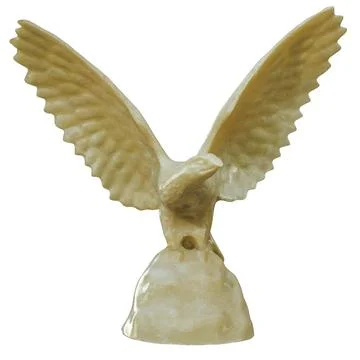 Carved ivory figurine of an eagle with spread wings on an isolated background Stock Illustration