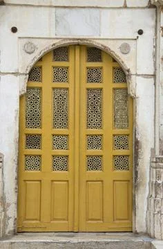 Carved jali on the outer wall of Sarkhej Roza, mosque and tomb complex. Ma... Stock Photos