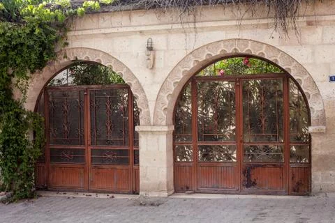 Carved large gate in the wall Stock Photos