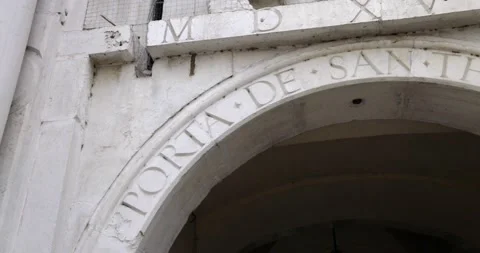 Carved name in the stone of the gate Saint Thomas San Tommaso one of the main Stock Footage 150154627