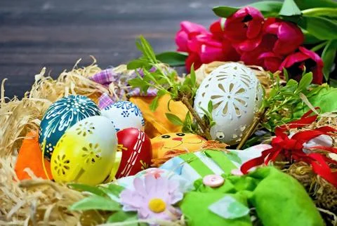 Carved painted white Easter egg with other ornaments grand feast. Stock Photos