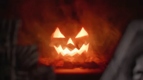 Carved pumpkin, jack o lantern, halloween theme, halloween decorations 库存影片 219661574