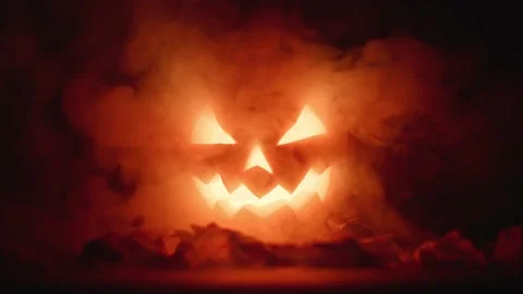 Carved pumpkin, jack o lantern, halloween theme, halloween decorations 库存影片 219661575