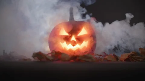 Carved pumpkin, jack o lantern, halloween theme, halloween decorations 库存影片 219661599