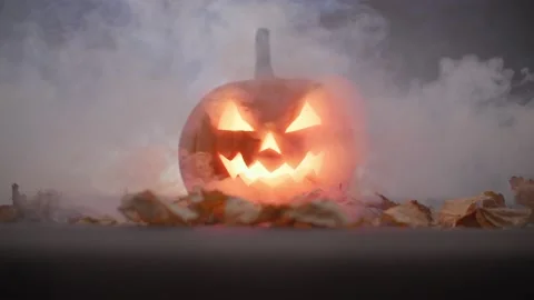 Carved pumpkin, jack o lantern, halloween theme, halloween decorations 库存影片 219661602