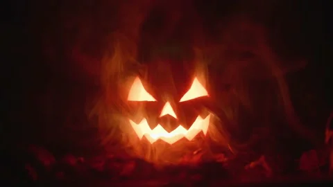 Carved pumpkin, jack o lantern, halloween theme, halloween decorations 库存影片 219661639