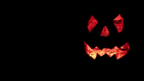 Carved pumpkin, jack o lantern, halloween theme, halloween decorations HALL.. Stock Footage 272460790