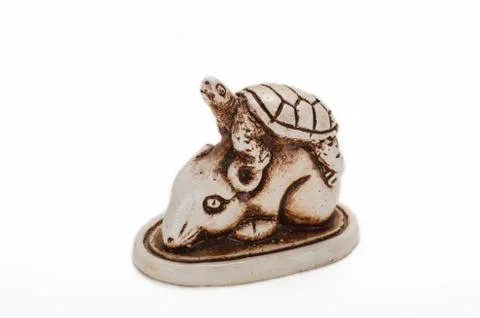 Carved turtle on rat netsuke 스톡 사진