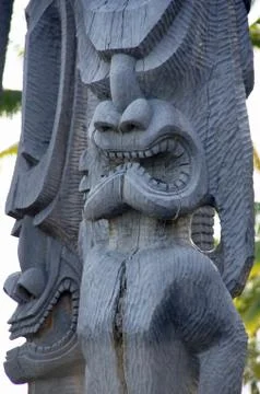 Carved wooden statue of ancient hawaiian god.. Stock Photos