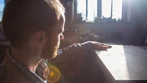 The carver chooses the workpiece Stock Footage 90948642