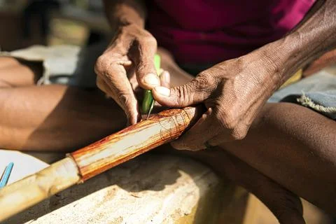 Carving the blowpipe Stock Photos