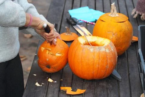 Carving a gourd Stock-Fotos