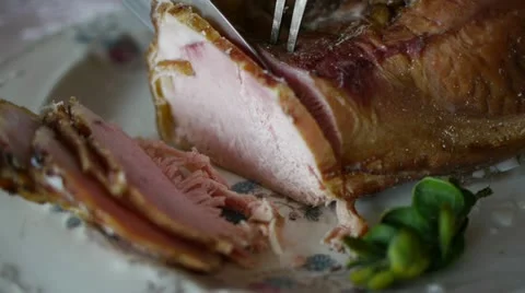 Carving ham slices Stock Footage 11858853