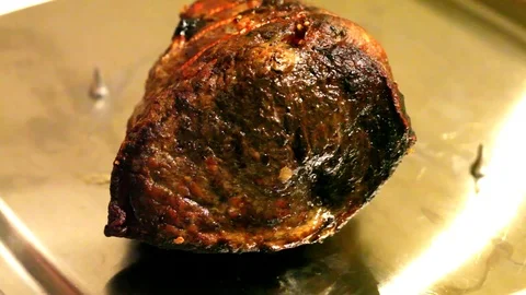 Carving roast beef joint close up Stock Footage 72380247