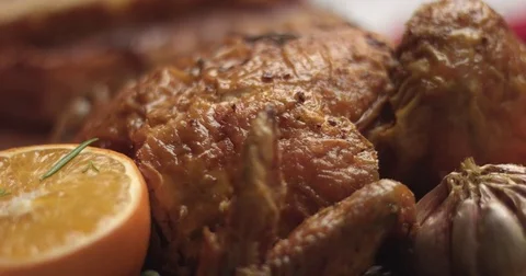 Carving roasted chicken on a festive table Stock Footage 82994459