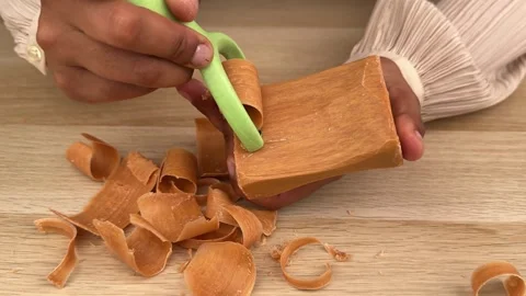 Carving a Soap Block with a Vegetable Peeler – Satisfying Soap Shaving Stock Footage 312741128