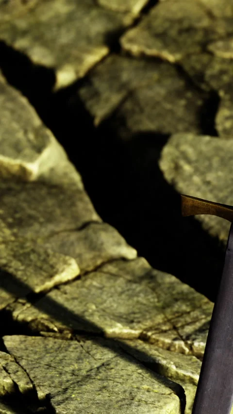 Carving stone with tools at a construction site during the afternoon Stock Footage 336582951