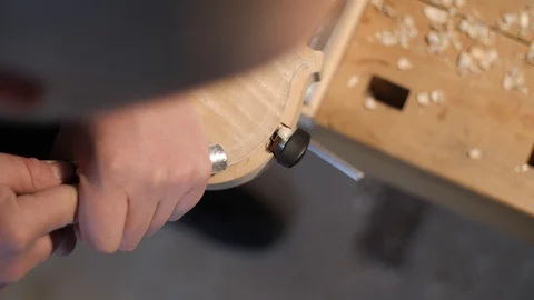 Carving a Violin / Making a Violin Stock Footage 108116308