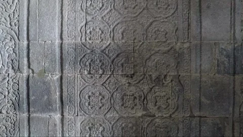 Carving on the wall inside Tower, Shiva Temple, Prambanan, Java, Indonesia Stock Footage 248444445